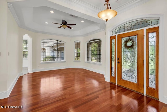 17000 River Pl, Vancleave, MS 39565 - entryway featuring wood finished floors, a tray ceiling, plenty of natural light, crown molding, and a ceiling fan