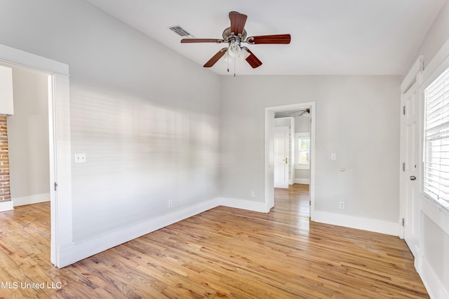 empty room with a healthy amount of sunlight and light wood-type flooring