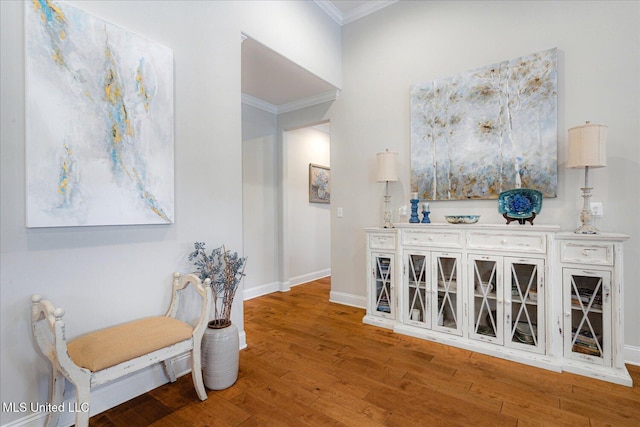 8063 Elizabeth Dr, Olive Branch, MS 38654 - hall featuring ornamental molding, wood finished floors, and baseboards