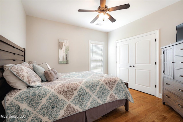 8063 Elizabeth Dr, Olive Branch, MS 38654 - bedroom with wood finished floors, a closet, and ceiling fan