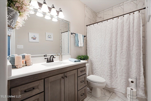8063 Elizabeth Dr, Olive Branch, MS 38654 - bathroom featuring marble finish floors, toilet, vanity, and a shower with shower curtain