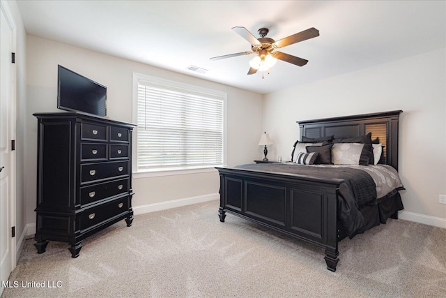 8063 Elizabeth Dr, Olive Branch, MS 38654 - bedroom with light colored carpet, baseboards, and ceiling fan