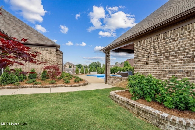 8063 Elizabeth Dr, Olive Branch, MS 38654 - view of green lawn featuring a patio
