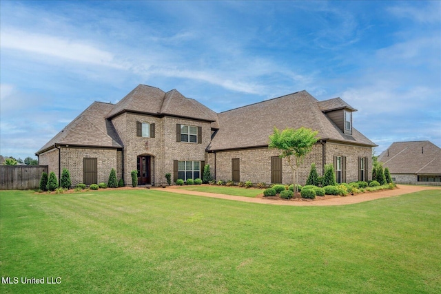 8063 Elizabeth Dr, Olive Branch, MS 38654 - french provincial home with brick siding and roof with shingles
