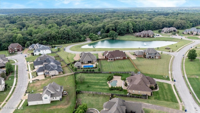 8063 Elizabeth Dr, Olive Branch, MS 38654 - aerial overview of property's location with a heavily wooded area, a nearby body of water, and nearby suburban area