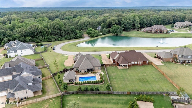 8063 Elizabeth Dr, Olive Branch, MS 38654 - aerial view of residential area featuring a nearby body of water, a heavily wooded area, and a pool area
