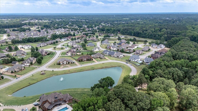 8063 Elizabeth Dr, Olive Branch, MS 38654 - aerial overview of property's location featuring a nearby body of water, nearby suburban area, and a heavily wooded area