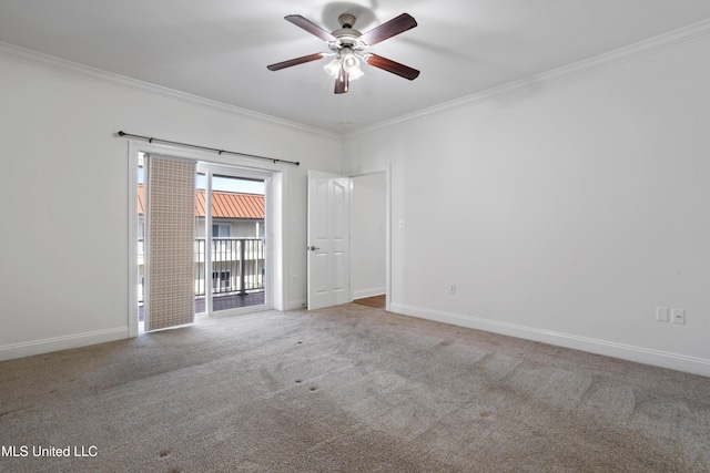 carpeted empty room with ceiling fan, baseboards, and ornamental molding