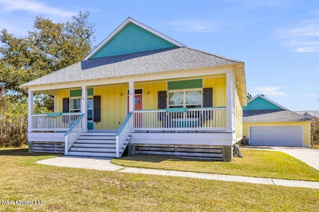 view of front of property featuring covered porch, a shingled roof, and a front yard