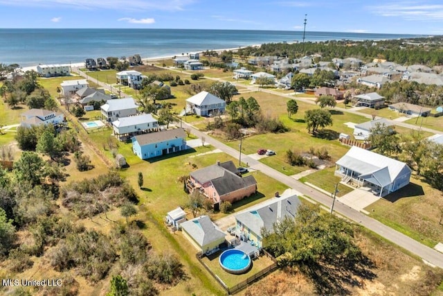 birds eye view of property featuring a residential view and a water view