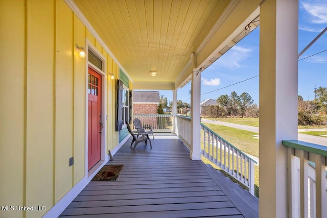 wooden deck featuring a porch