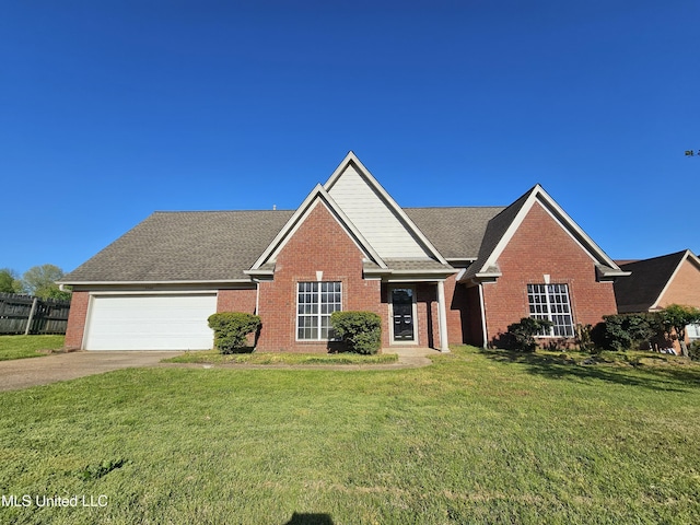 5746 Eagleston Dr, Olive Branch, MS 38654 - ranch-style home featuring driveway, an attached garage, a front yard, brick siding, and fence