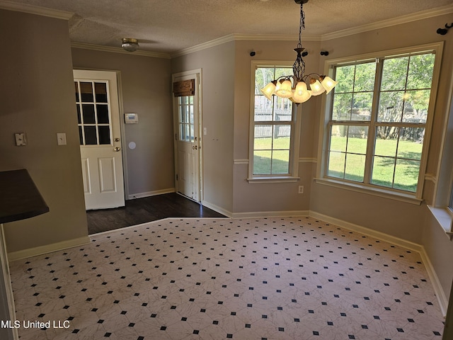 5746 Eagleston Dr, Olive Branch, MS 38654 - unfurnished dining area with a healthy amount of sunlight, an inviting chandelier, baseboards, and dark wood finished floors