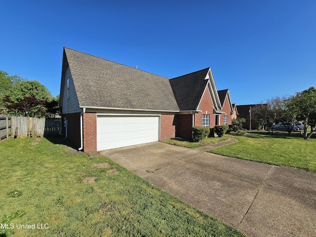 5746 Eagleston Dr, Olive Branch, MS 38654 - view of property exterior with brick siding, concrete driveway, fence, and a lawn