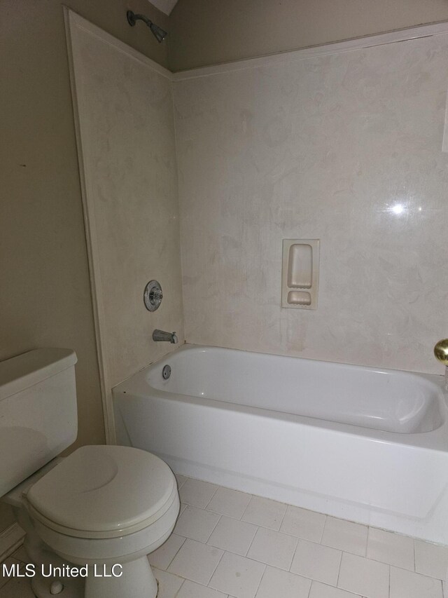 5746 Eagleston Dr, Olive Branch, MS 38654 - full bath with washtub / shower combination, tile patterned flooring, and toilet
