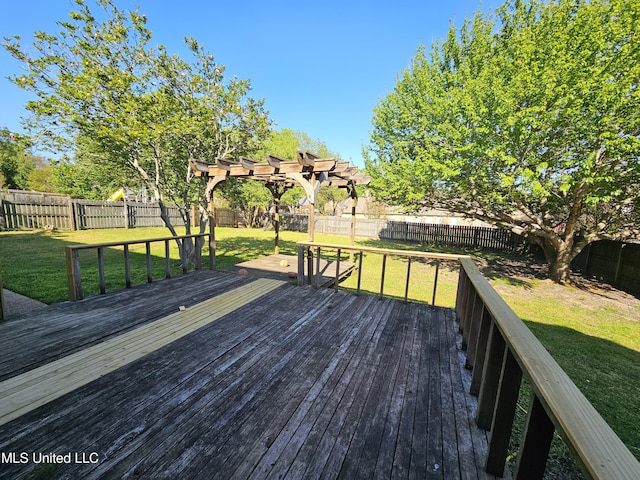 5746 Eagleston Dr, Olive Branch, MS 38654 - wooden deck featuring a pergola, a fenced backyard, and a lawn