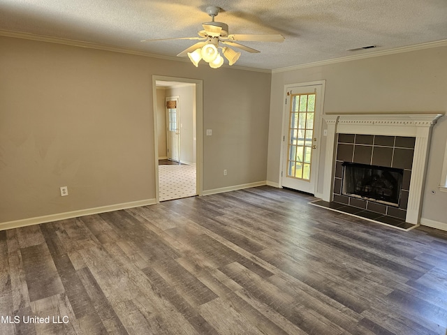 5746 Eagleston Dr, Olive Branch, MS 38654 - unfurnished living room with dark wood-type flooring, visible vents, a ceiling fan, and a textured ceiling
