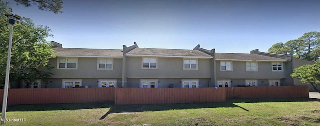 1625 Martin Bluff Rd Unit 97, Gautier, MS 39553 - back of house featuring stucco siding
