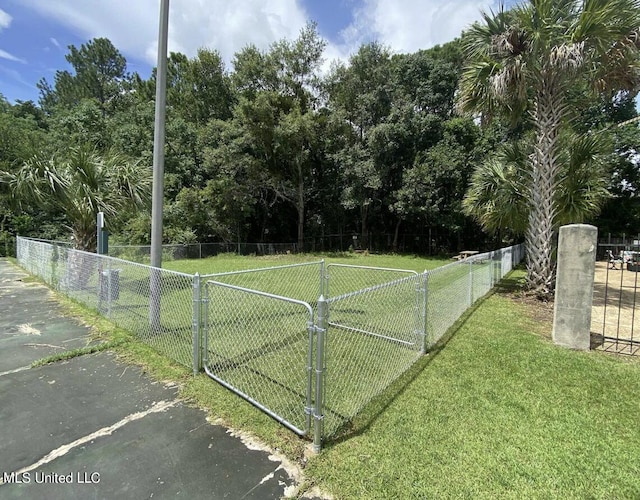 1625 Martin Bluff Rd Unit 97, Gautier, MS 39553 - view of yard featuring a gate