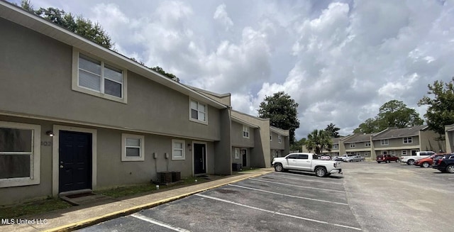 1625 Martin Bluff Rd Unit 97, Gautier, MS 39553 - uncovered parking lot featuring a residential view