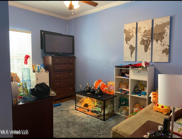 playroom with crown molding and a ceiling fan