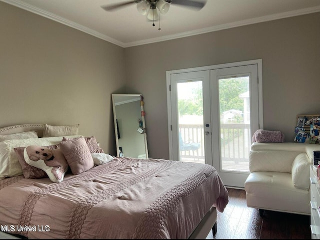 bedroom featuring access to exterior, crown molding, wood finished floors, and french doors