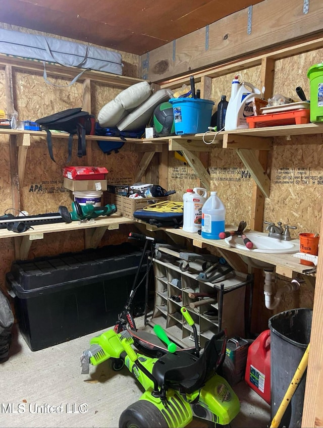 storage room featuring a sink
