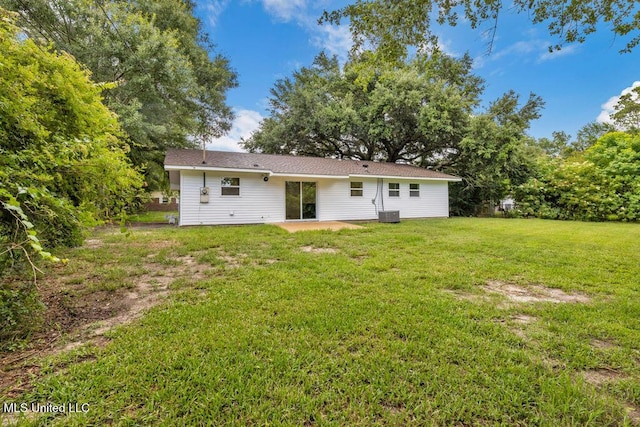 6544 Columbus Cir, Ocean Springs, MS 39564 - rear view of house with a patio area and a yard