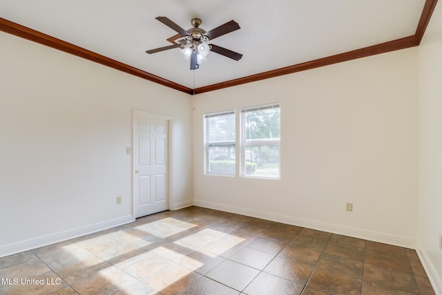 empty room featuring crown molding, baseboards, and ceiling fan