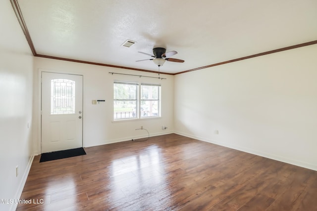 foyer featuring visible vents, baseboards, ceiling fan, and dark wood-style floors