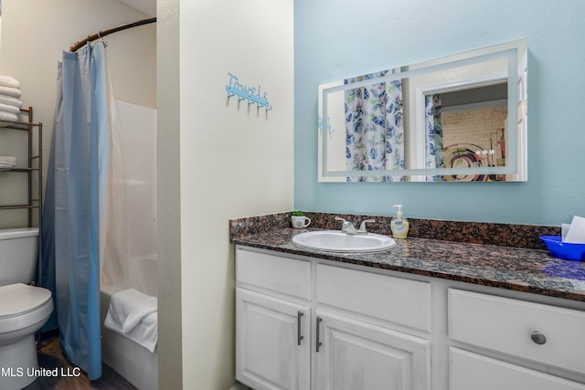 full bathroom featuring vanity, shower / bath combination with curtain, wood-type flooring, and toilet