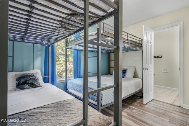 bedroom featuring hardwood / wood-style flooring