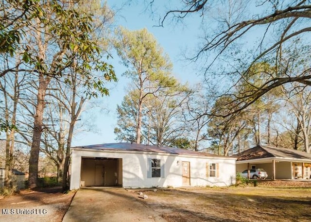 exterior space featuring driveway