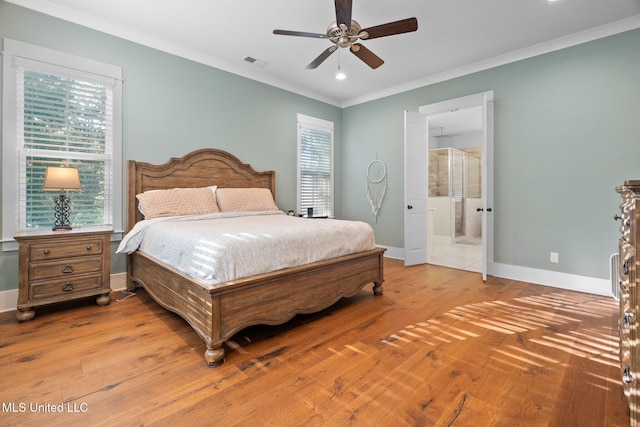 1075 S Laughter Rd, Hernando, MS 38632 - bedroom with crown molding, baseboards, wood finished floors, ensuite bathroom, and ceiling fan