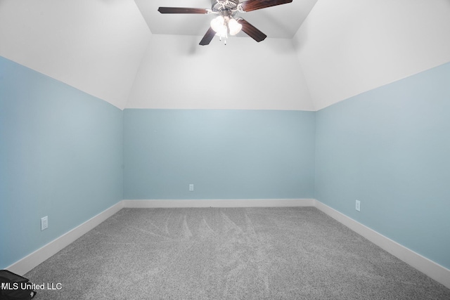 1075 S Laughter Rd, Hernando, MS 38632 - carpeted spare room with ceiling fan, baseboards, and vaulted ceiling