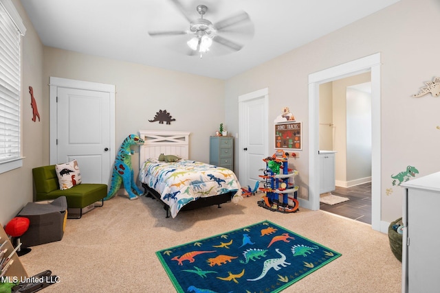 1075 S Laughter Rd, Hernando, MS 38632 - bedroom with carpet floors, ceiling fan, and baseboards