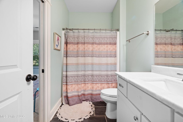 1075 S Laughter Rd, Hernando, MS 38632 - bathroom featuring vanity, toilet, tile patterned floors, and curtained shower