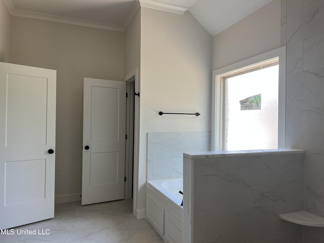 609 Cobalt Way, Brandon, MS 39042 - bathroom featuring marble finish flooring, a bath, and ornamental molding