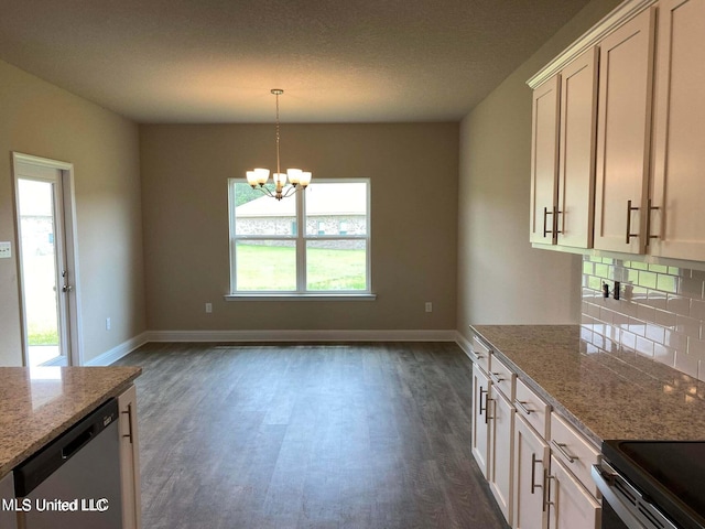 kitchen with tasteful backsplash, light stone countertops, dark hardwood / wood-style flooring, pendant lighting, and stainless steel dishwasher