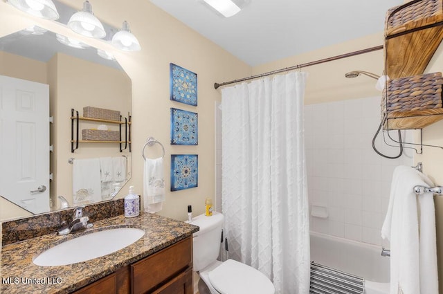 2421 Beachview Dr Unit B02, Ocean Springs, MS 39564 - bathroom featuring vanity, toilet, and shower / tub combo