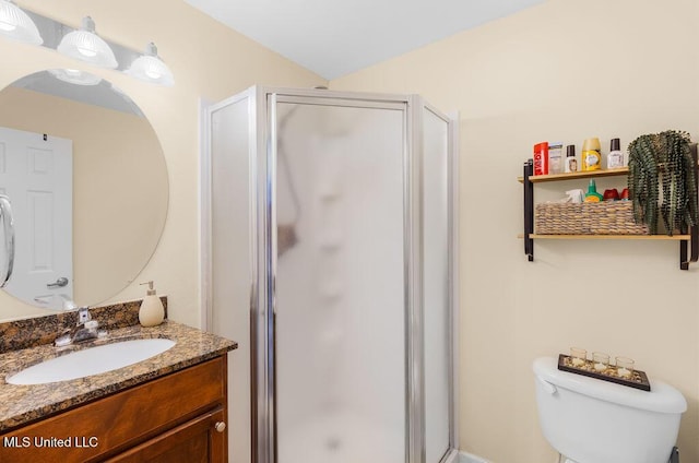 2421 Beachview Dr Unit B02, Ocean Springs, MS 39564 - bathroom with toilet, a shower stall, and vanity