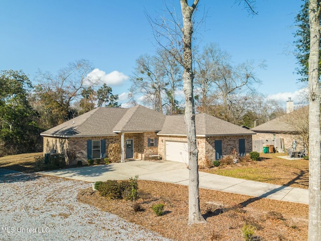 single story home featuring a garage