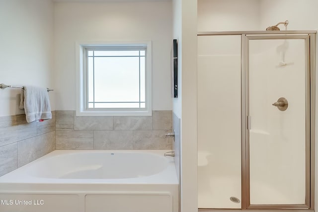 bathroom with independent shower and bath