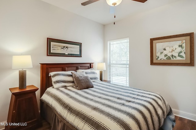 bedroom featuring hardwood / wood-style flooring and ceiling fan