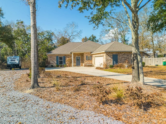 ranch-style house featuring a garage