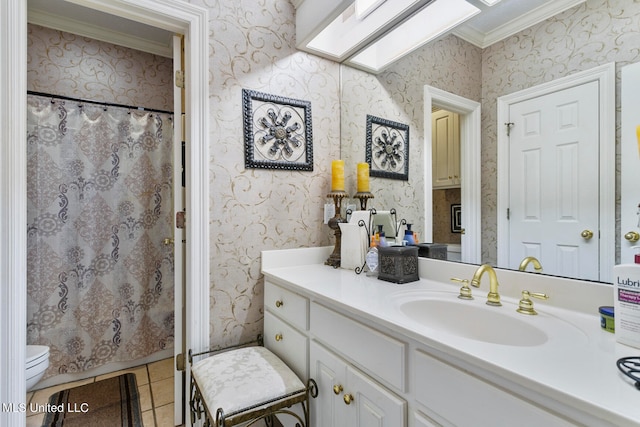 bathroom with toilet, a shower with curtain, vanity, ornamental molding, and tile patterned flooring