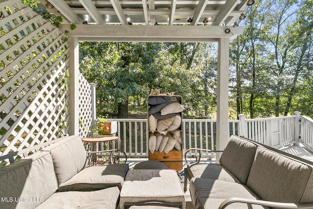 view of patio / terrace with an outdoor living space and a pergola