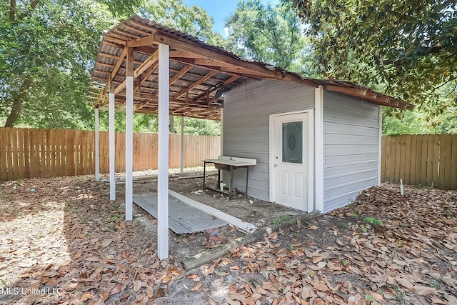 view of patio with a shed