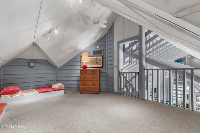 additional living space featuring lofted ceiling and carpet floors