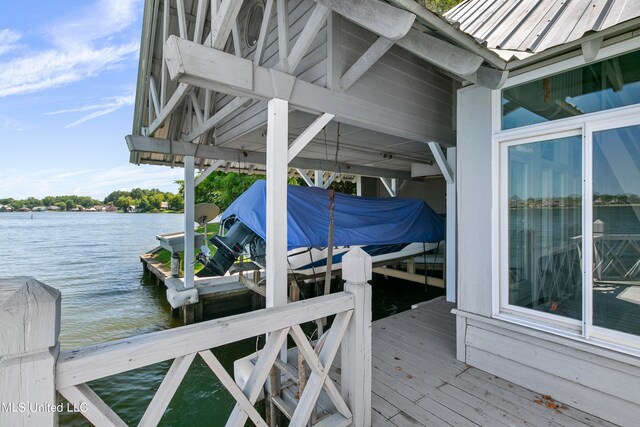 dock area with a water view